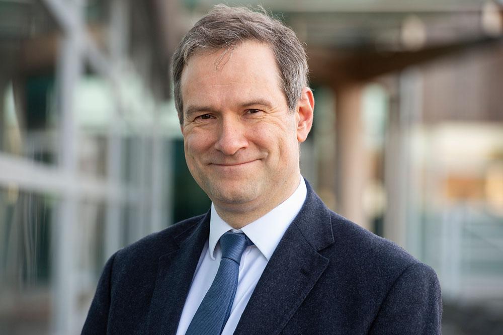 Headshot of Andrew White