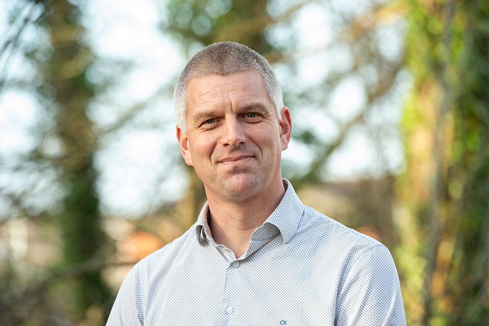 Headshot of Prof John Hammond
