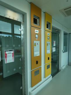 Laboratory corridor with glass entrance door to lobby.
